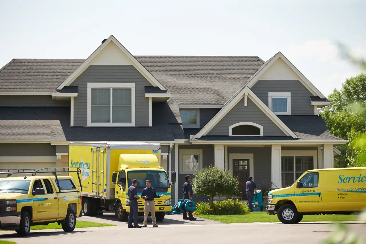 ServiceMaster crews arriving at a residence to begin restoration.
