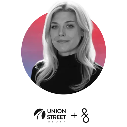 Portrait of a smiling woman with long blonde hair wearing a black turtleneck against a red and purple gradient circular background.