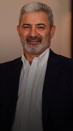 Fazıl Oral, liderlik ve yönetim düşünürü, jeoekonomi stratejisti, portre
