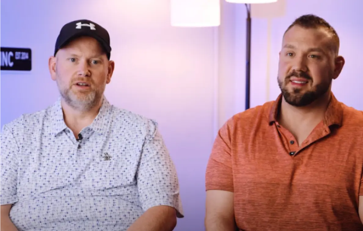 two men being interviewed