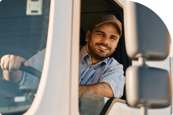 truck driver smiling out window