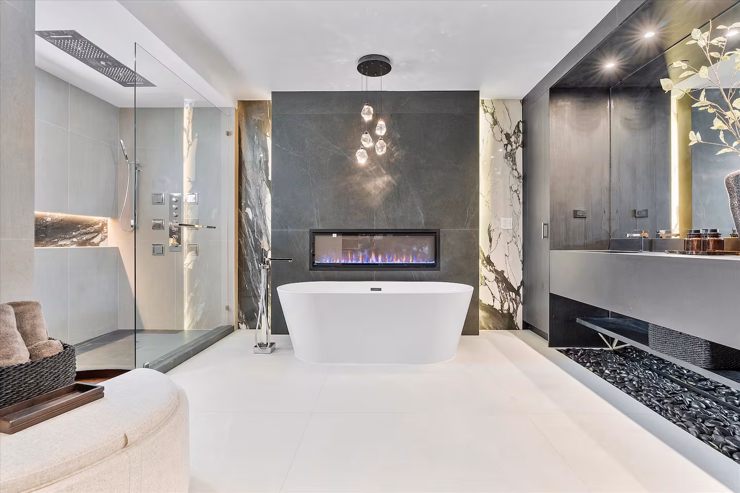 A contemporary bathroom featuring a freestanding soaking tub and a walk-in shower. 