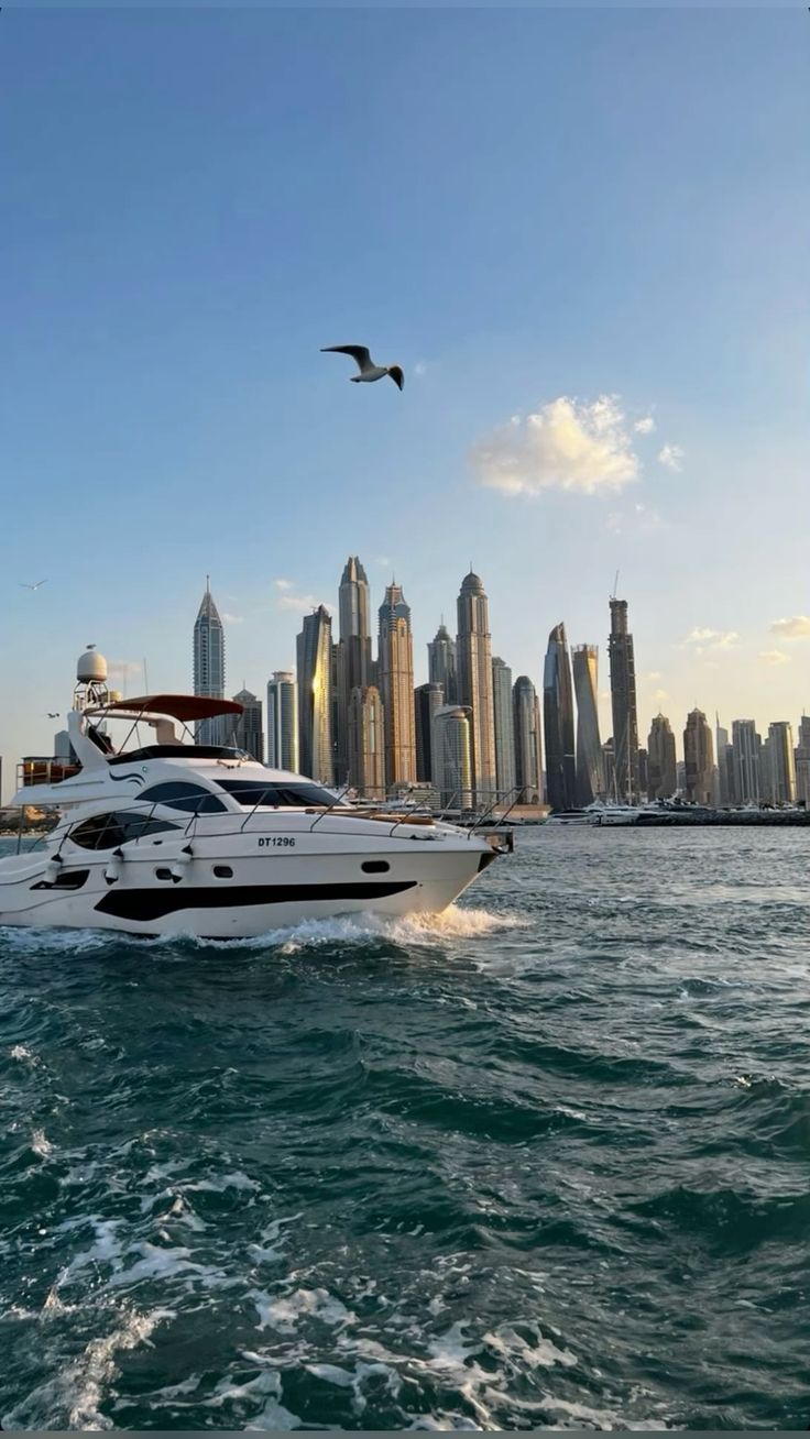image of a luxury yacht cruising at sunset
