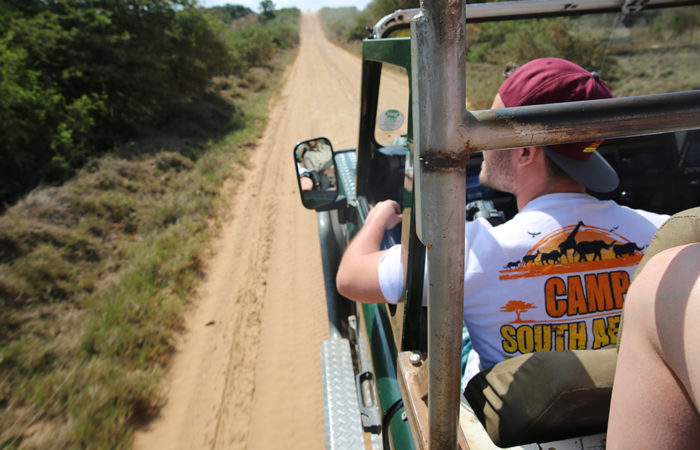 Image of camper driving through the savannah as as wildlife sanctuary south africa volunteer with Further Travel.