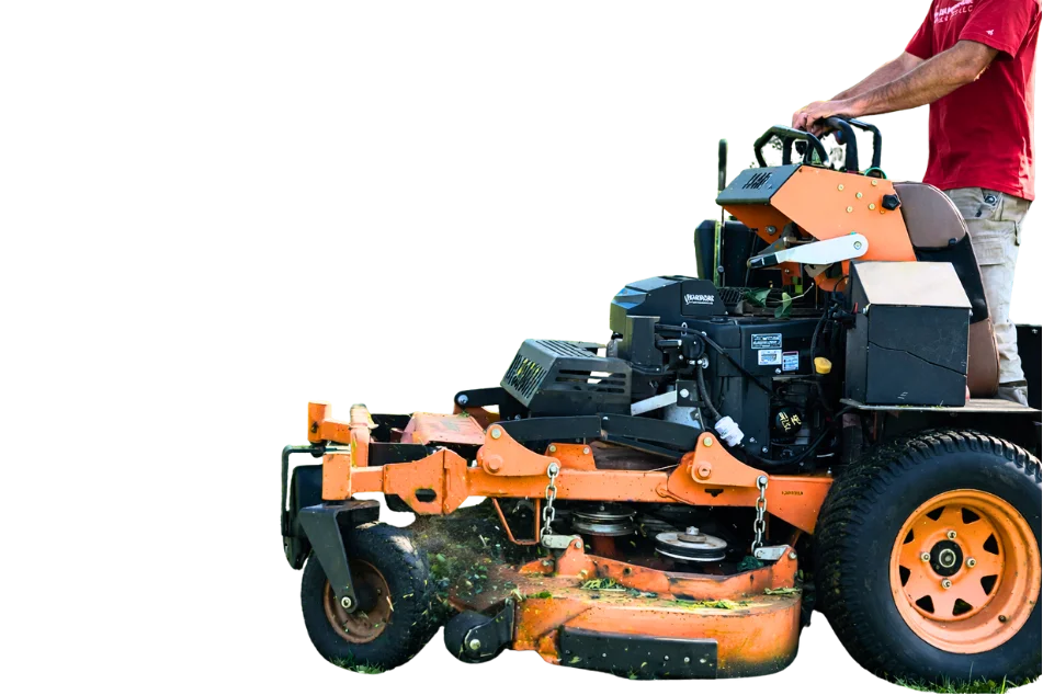 Person operating an orange zero-turn riding lawn mower cutting grass.