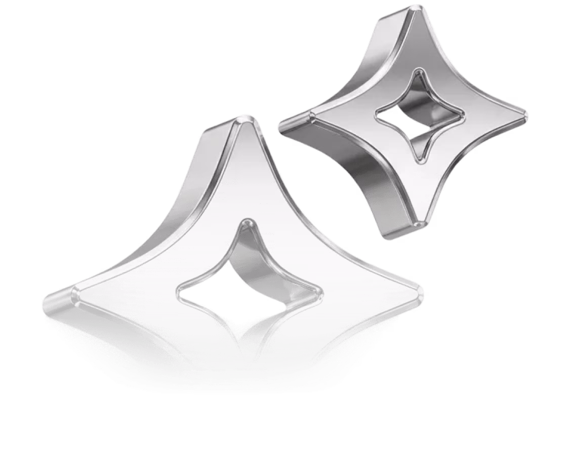 Two shiny silver star-shaped objects with hollow diamond-shaped centers floating on a transparent background.