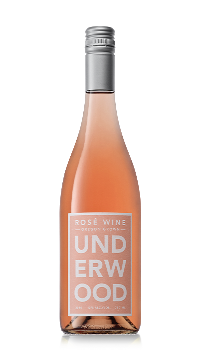 Bottle of Underwood Oregon grown rosé wine with a silver cap and light pink color.