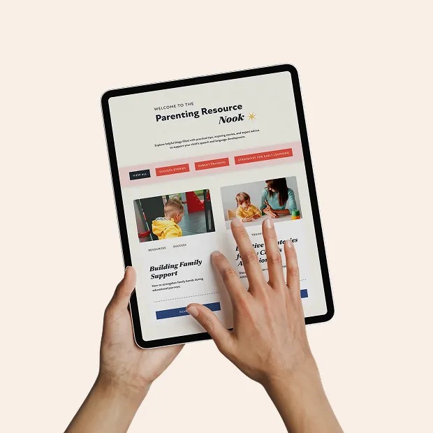 Speech Language Nook website on a tablet with hands