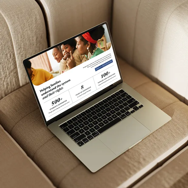 Speech Language Nook website on a laptop on a couch