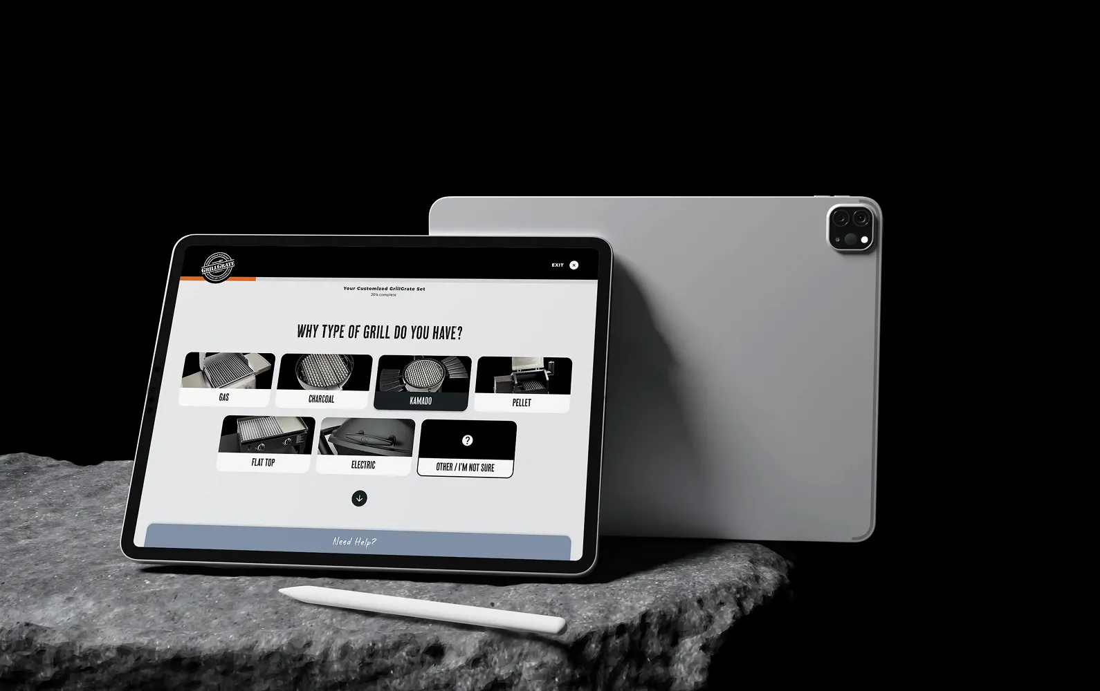 GrillGrate product discover tool on a tablet sitting on a rock