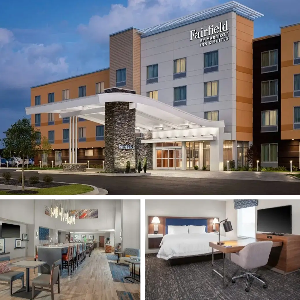 Exterior of Fairfield by Marriott Inn & Suites hotel at dusk, with illuminated entrance, lobby area with seating and bar, and a guest room featuring a bed, desk, chair, and TV.