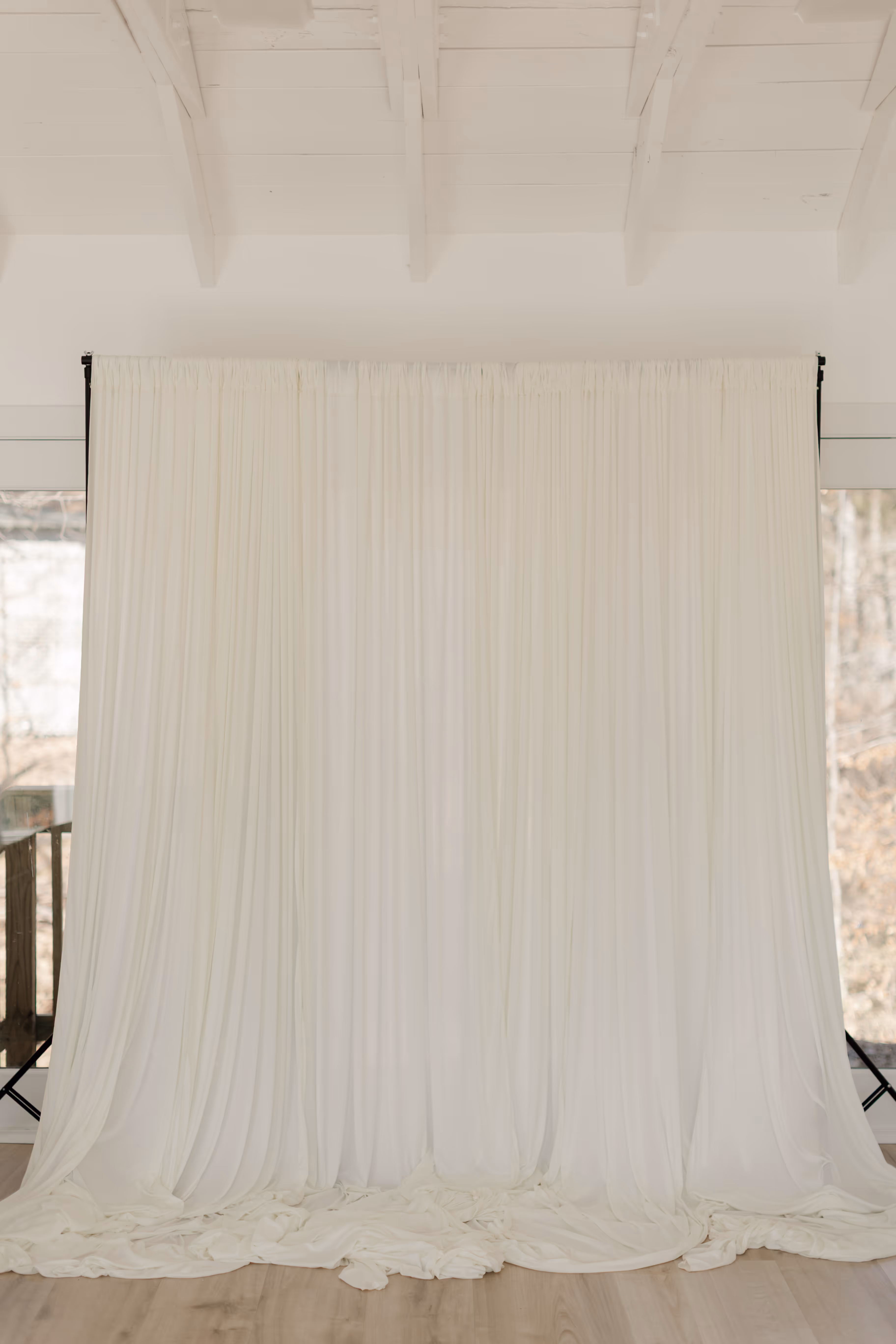 A white backdrop setup inside Brightroom Studio