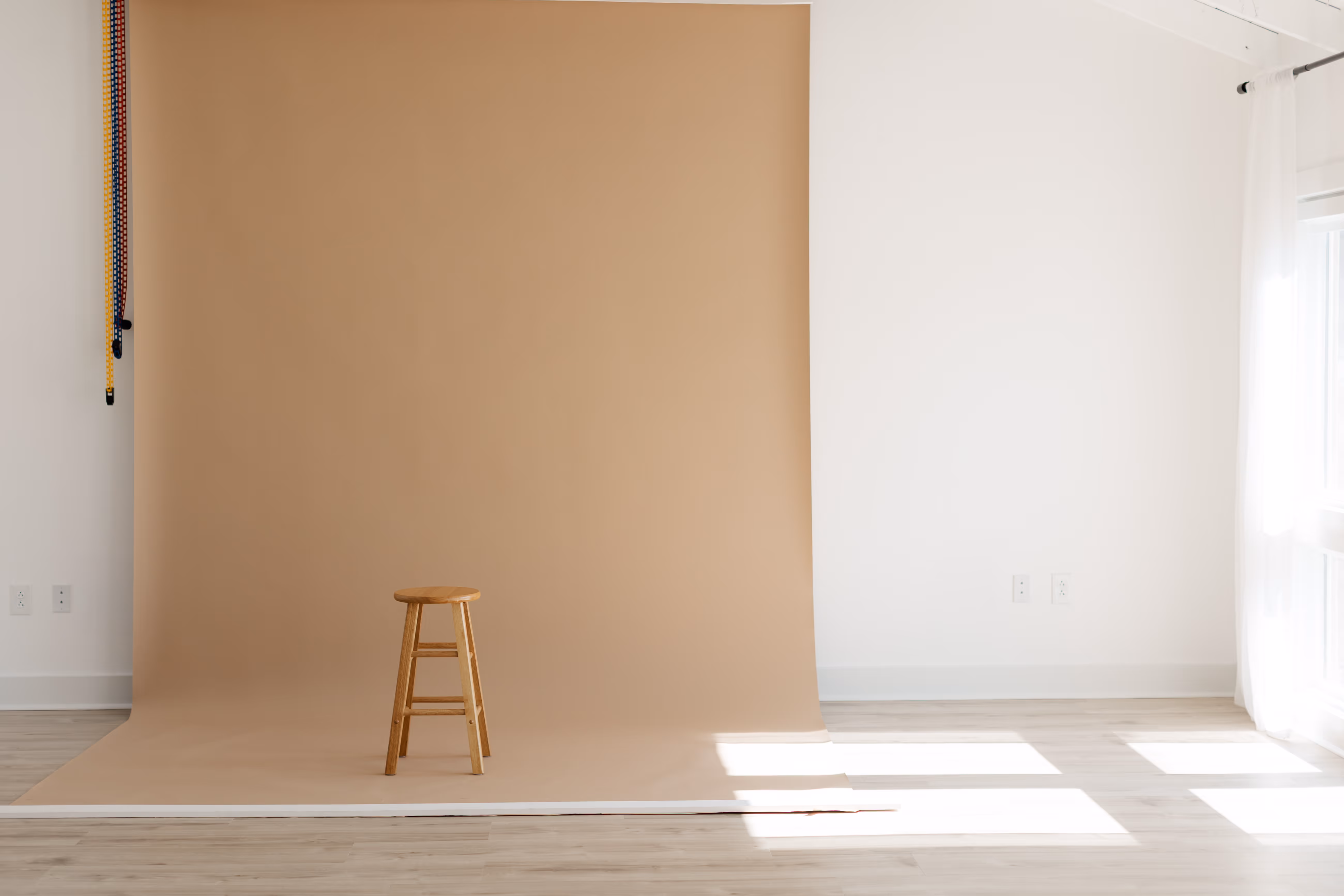 A brown wooden chair in front of a brown backdrop in Brightoom Studio