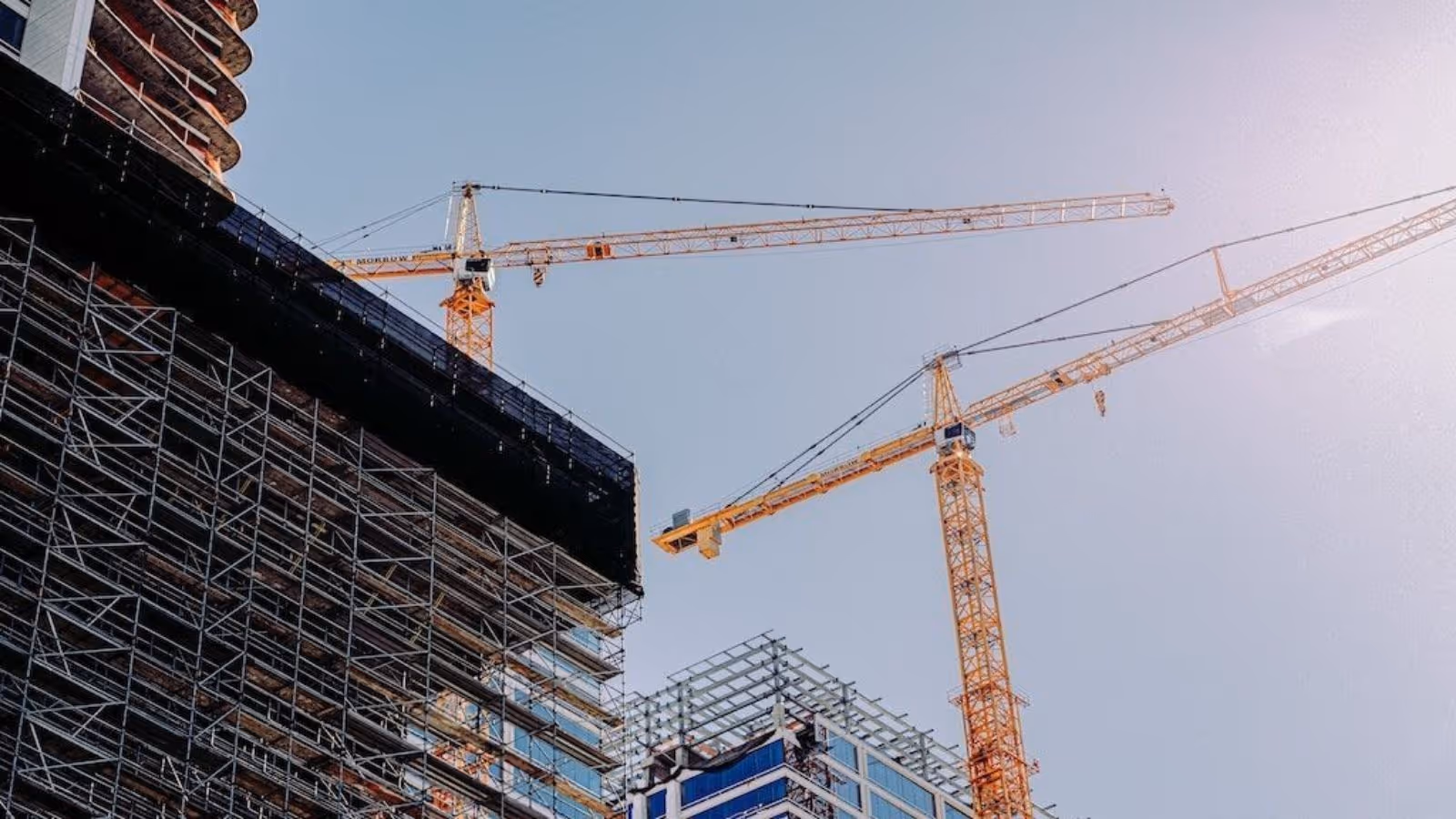 Commercial construction site with high-rise buildings and cranes