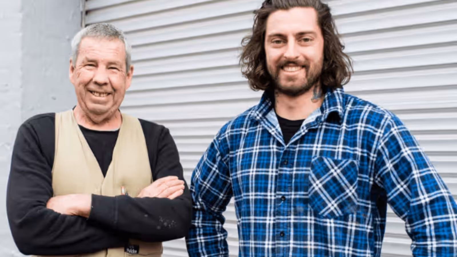 The team at Samba Plumbing with Director Billie Bianco on the right, standing in front of a garage door