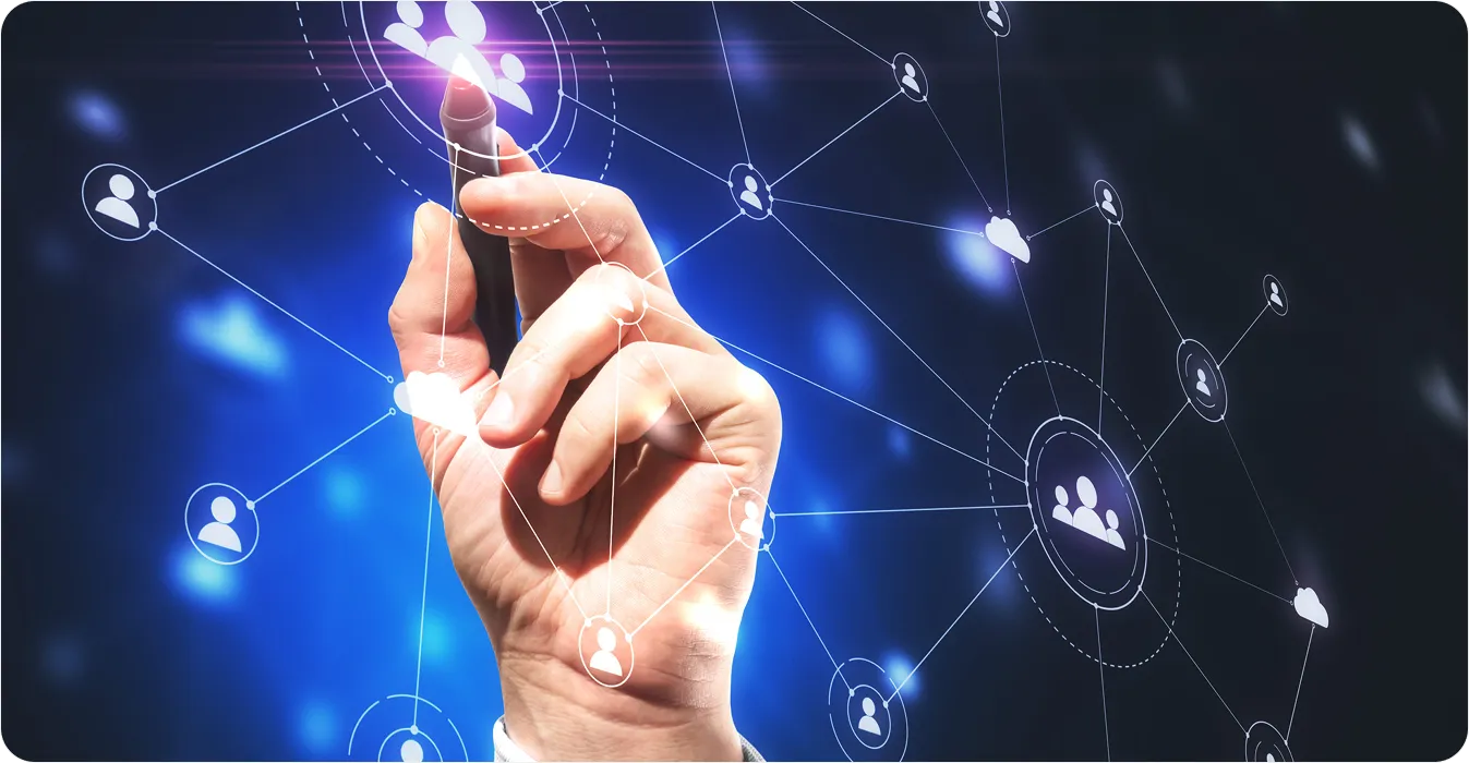 Hand pointing at interconnected user icons representing a digital social network and cloud connections.