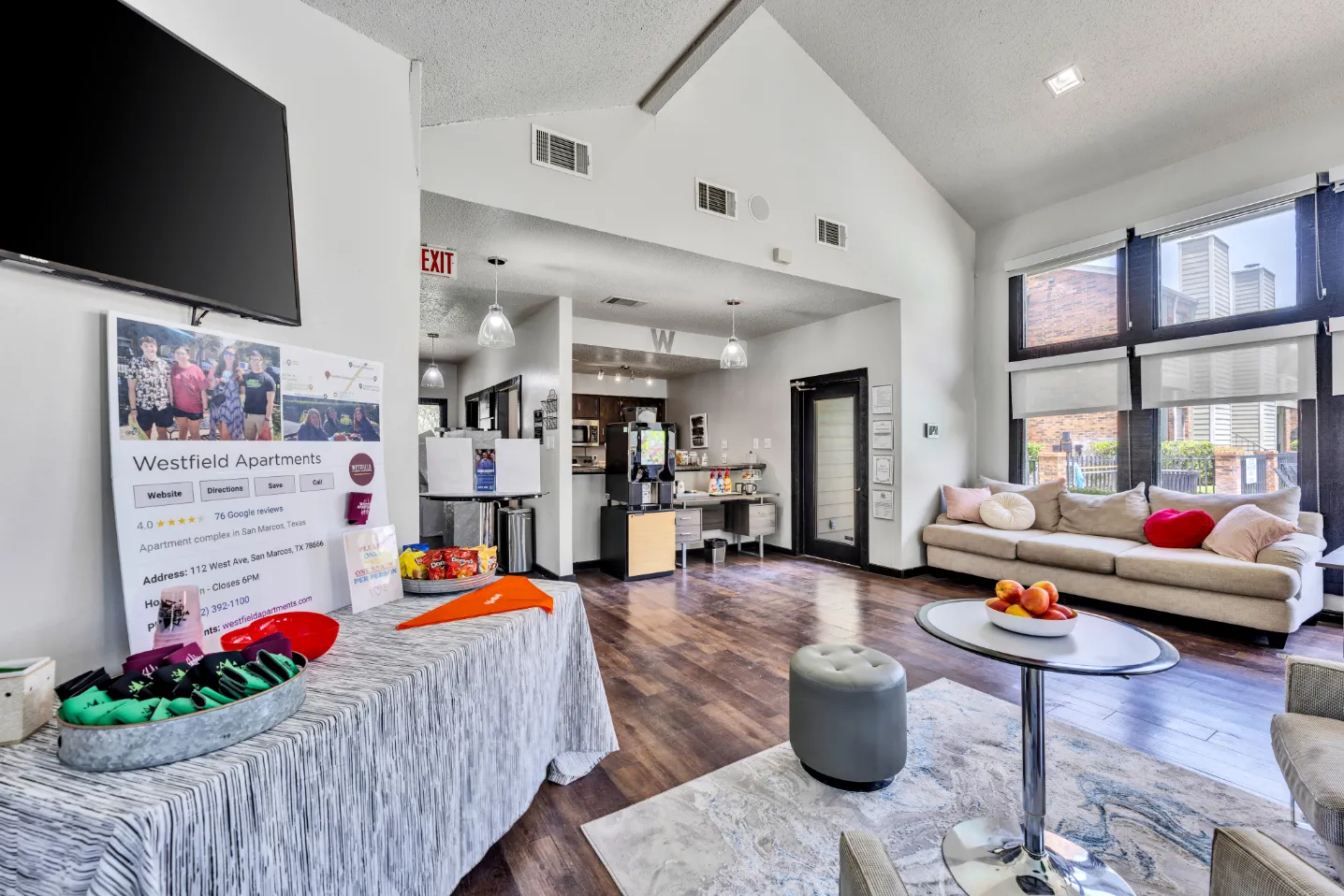 Lounge area with tv and sofa