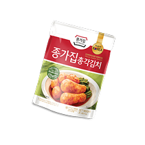 Package of Jongga brand Korean kimchi with an image of kimchi and green leaves on the front.