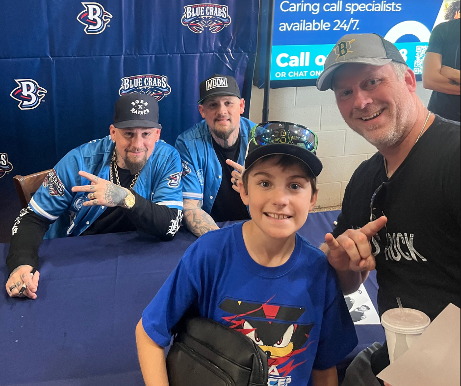 Jake and his son with Good Charlotte