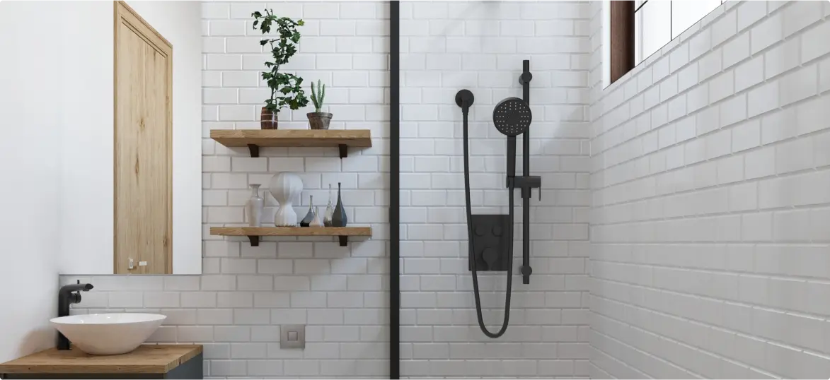 Modern bathroom with white subway tiles, black shower fixtures, wooden shelves with decorative vases and plants, and a white vessel sink on a wooden countertop.