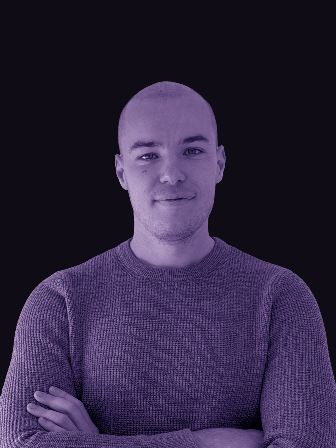 Marko Portrait - Man with arms crossed wearing a textured sweater against a dark background.