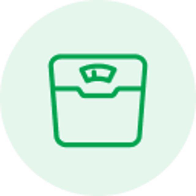 Green outline icon of a weighing scale on a light green circular background.