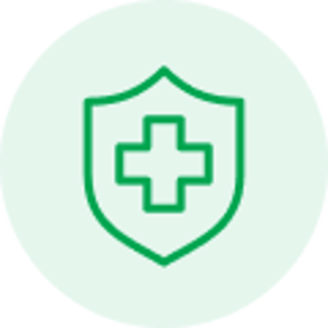 Green shield with a medical cross symbol inside on a light green circular background.