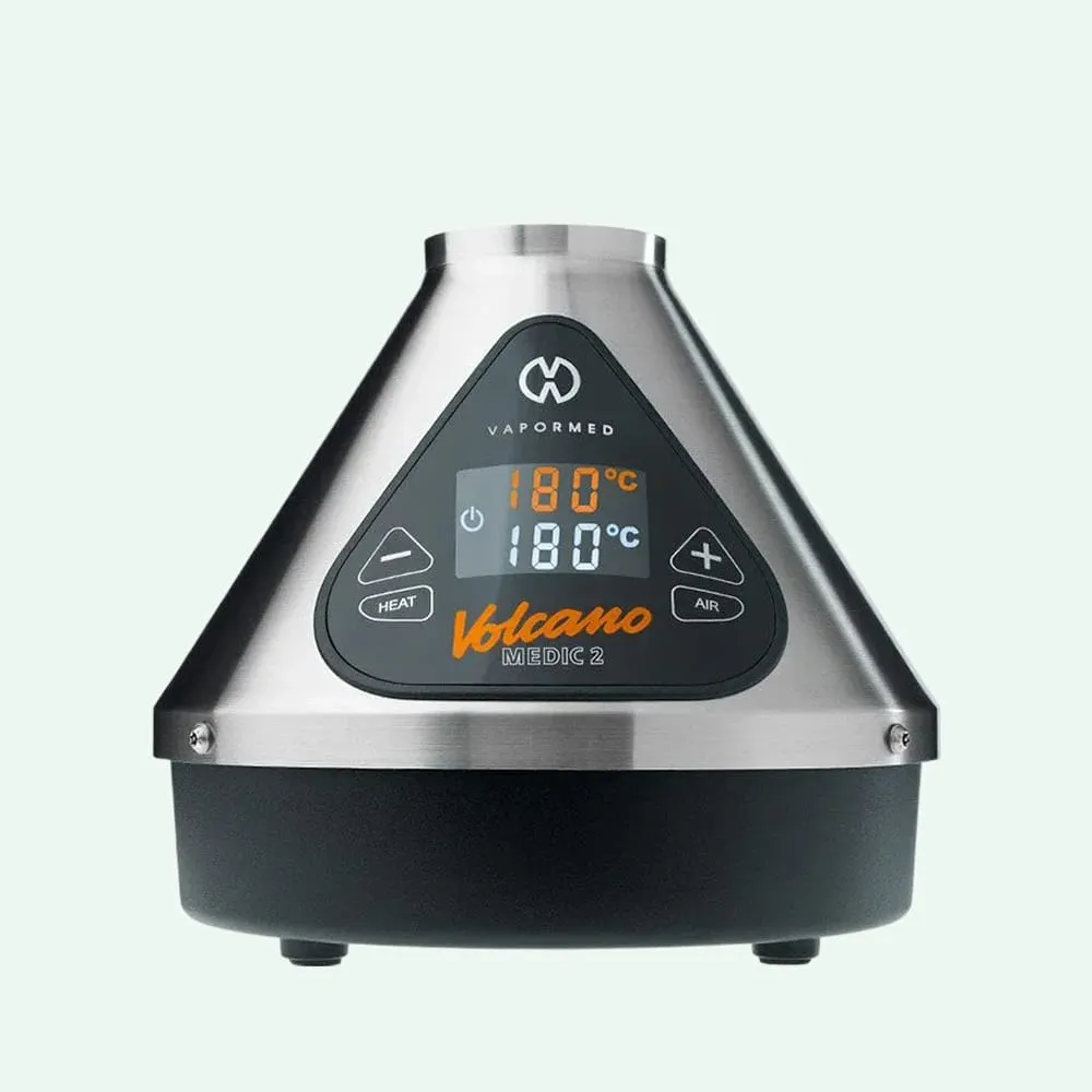 VaporMed Volcano Medic 2 vaporizer with digital temperature display showing 180°C and control buttons for heat and air.