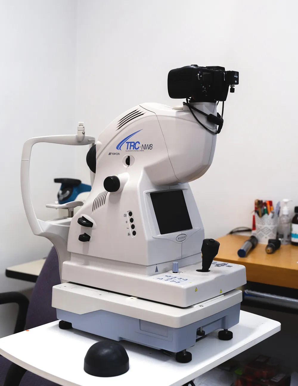 Topcon TRC-NW8 non-mydriatic retinal camera in a clinical room.