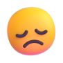 Жовто-помаранчеве емодзі з сумним виразом обличчя та закритими очима.