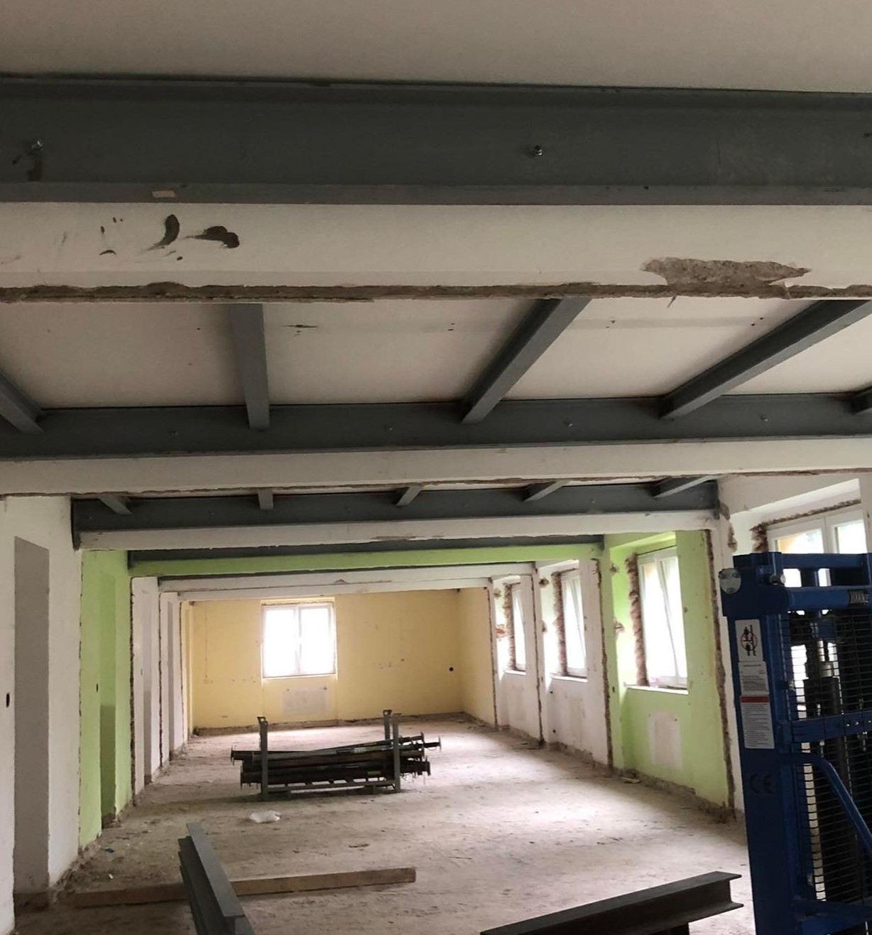 Structural ceiling reinforcement using HEB100 and UPE240 steel profiles during the reconstruction of a senior care facility in Žďár nad Sázavou.