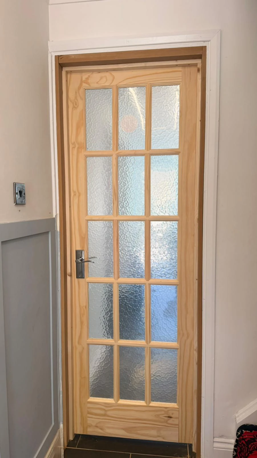 Traditional 15 lite knotty pine obscure glazed internal door fitted in Basingstoke.