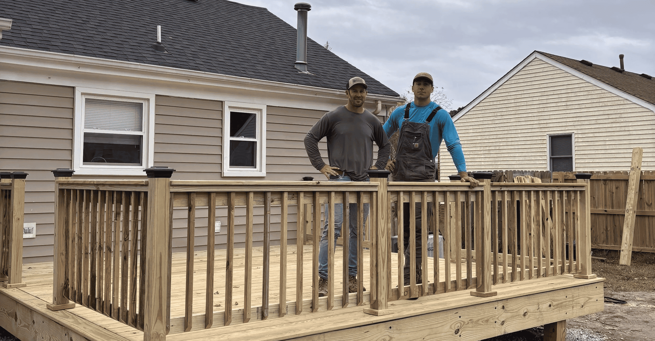 The Andrae's Landscaping crew on a newly built deck