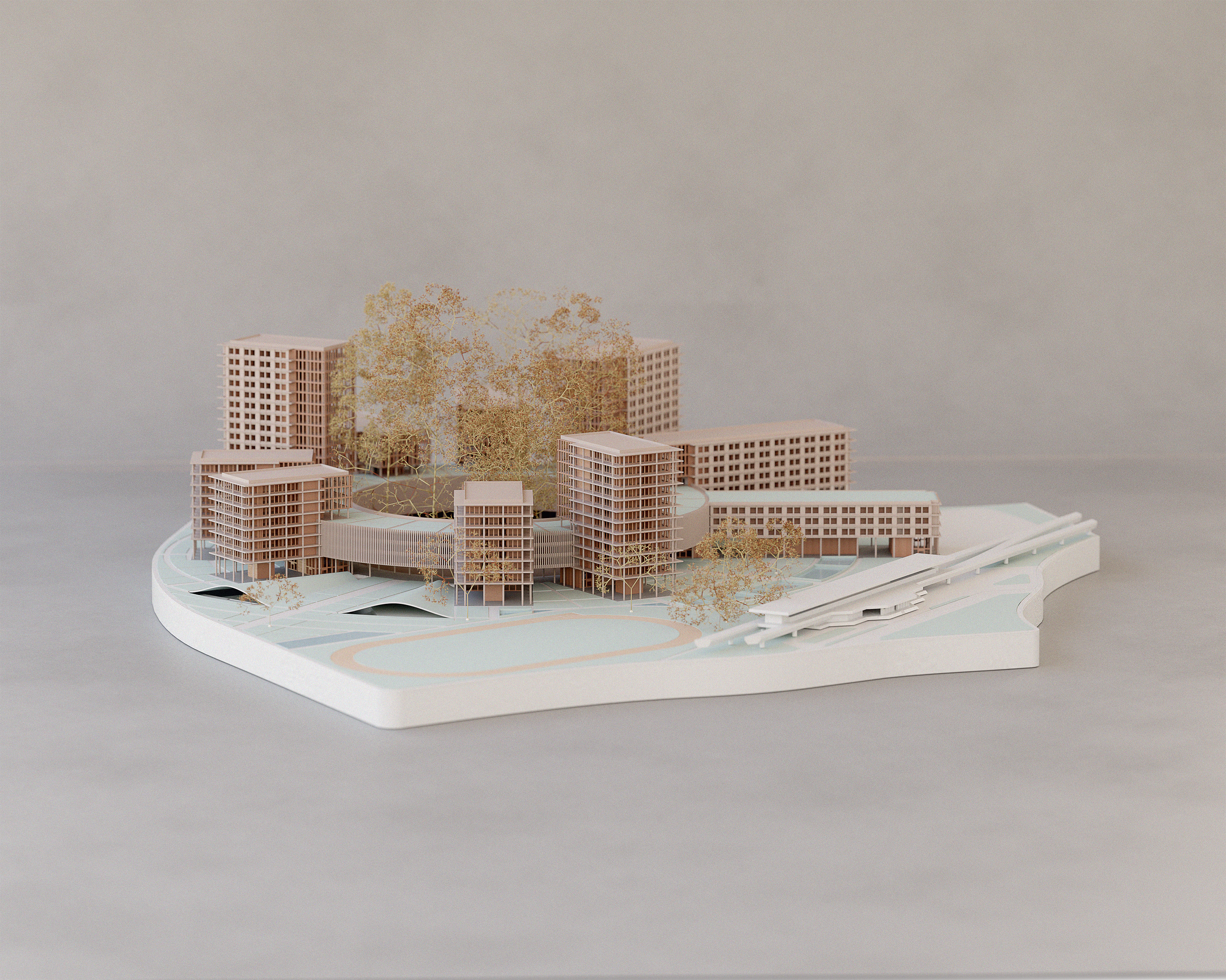 Architectural model showing multi-storey buildings arranged around a tree-filled courtyard, with open ground floors and curving paths.