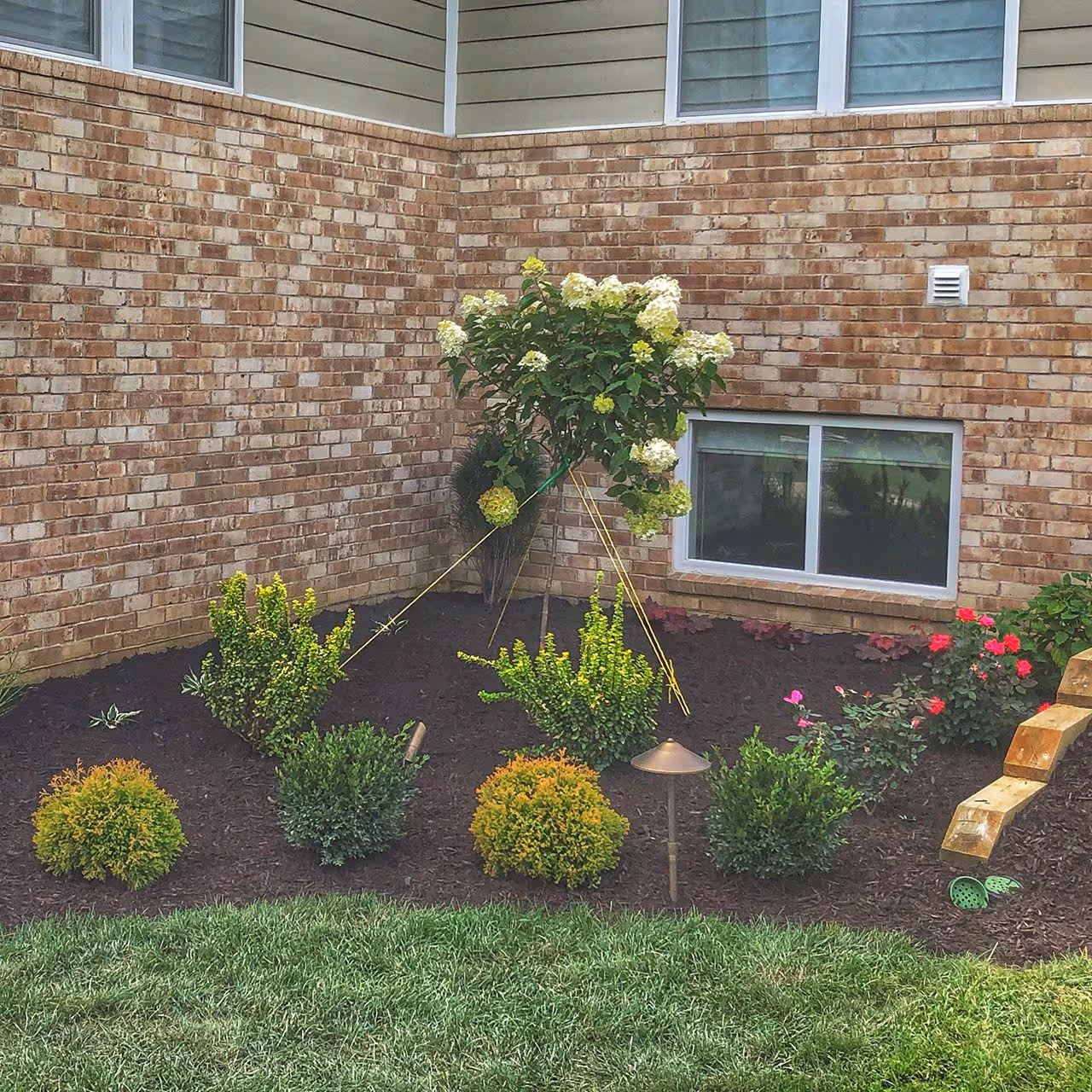 Shrub trimming and garden bed maintenance by Gould Brothers Outdoor Solutions LLC
