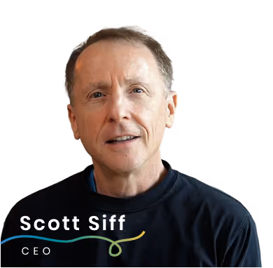 Scott Siff, CEO of Pivoters, standing in front of an office