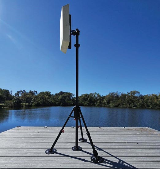 BlueSky Mast 200 Sidekick Series tripod with a panel antenna on a dock