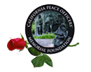 Logo of the Colonial Place Owners Association featuring a green tree and white building inside a circular frame with text.