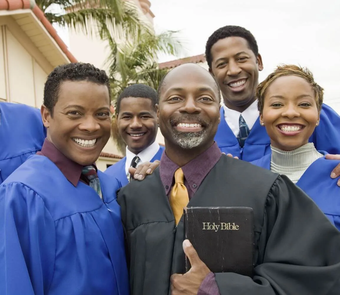a group of men and women posing for a picture