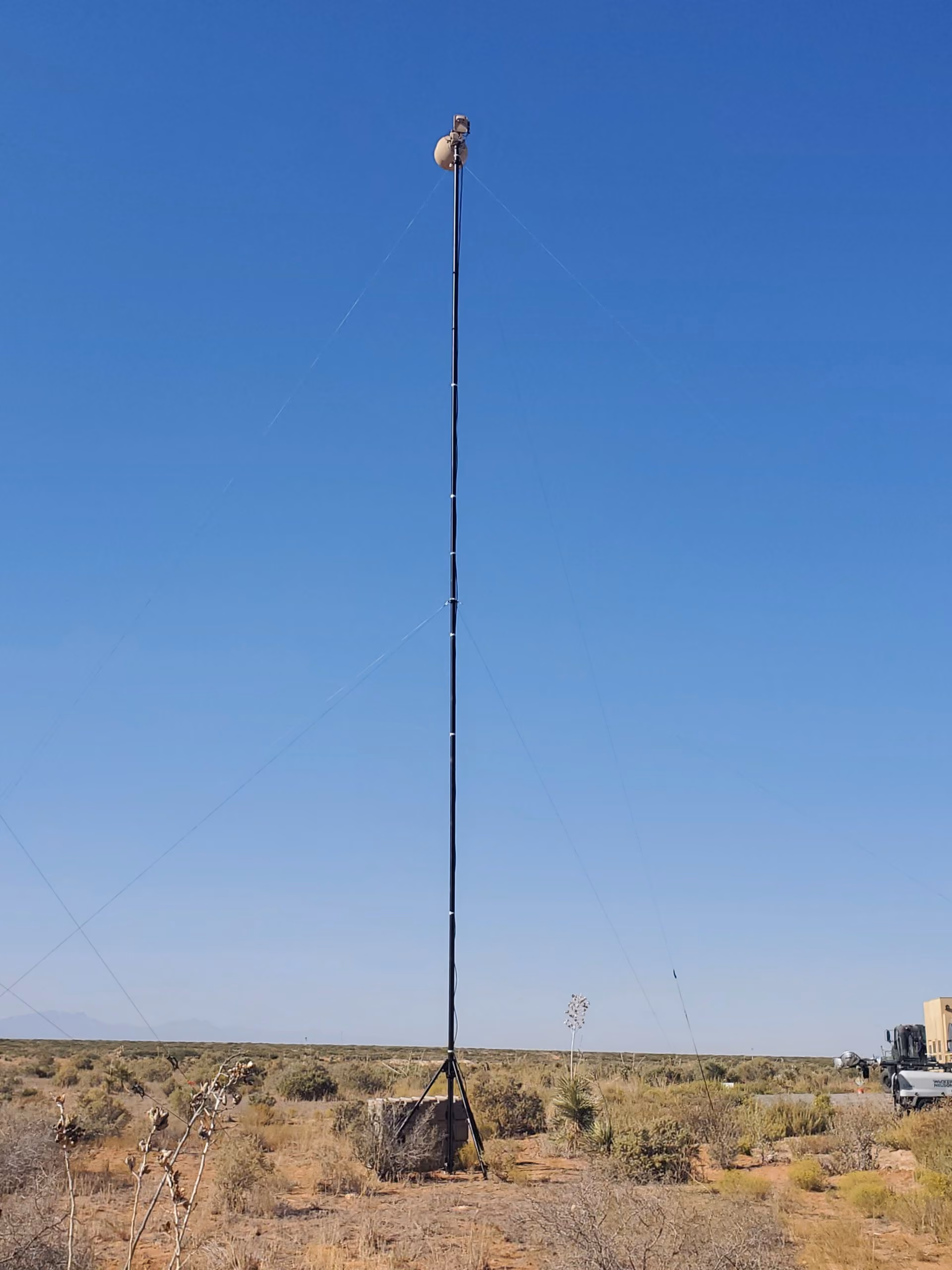 BlueSky Mast 350 Lift Series with Cambium Networks PTP 700 point-to-point radio, deployed in the field, tactical communications application