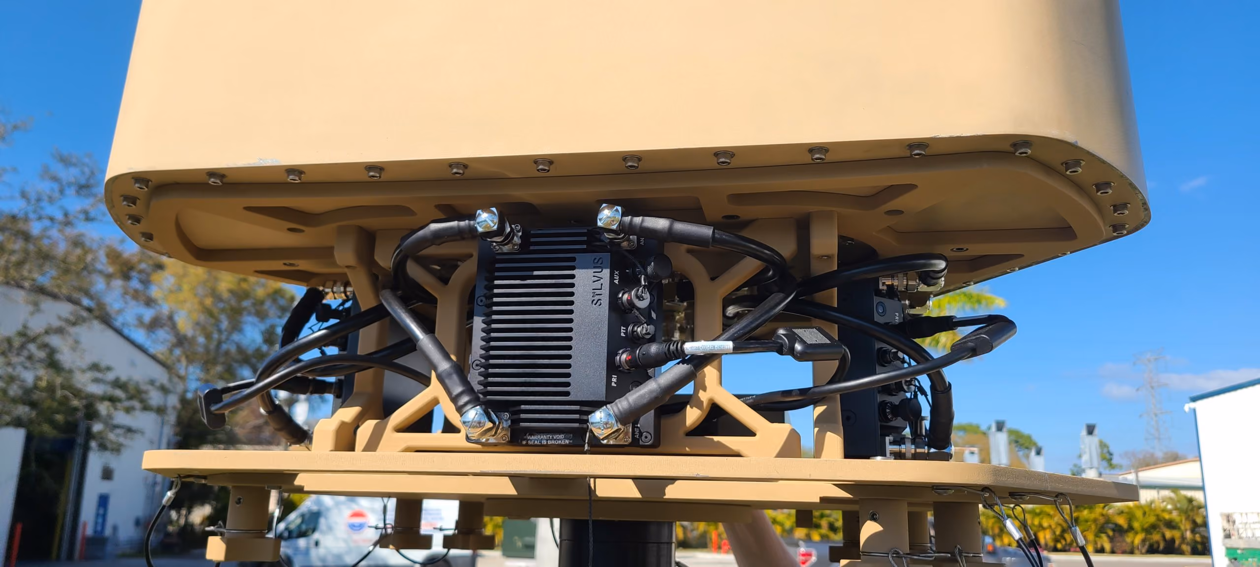 BlueSky Mast 350 Lift Series with Silvus Technologies StreamCaster MANET radio kit, deployed in the field, tactical communications application