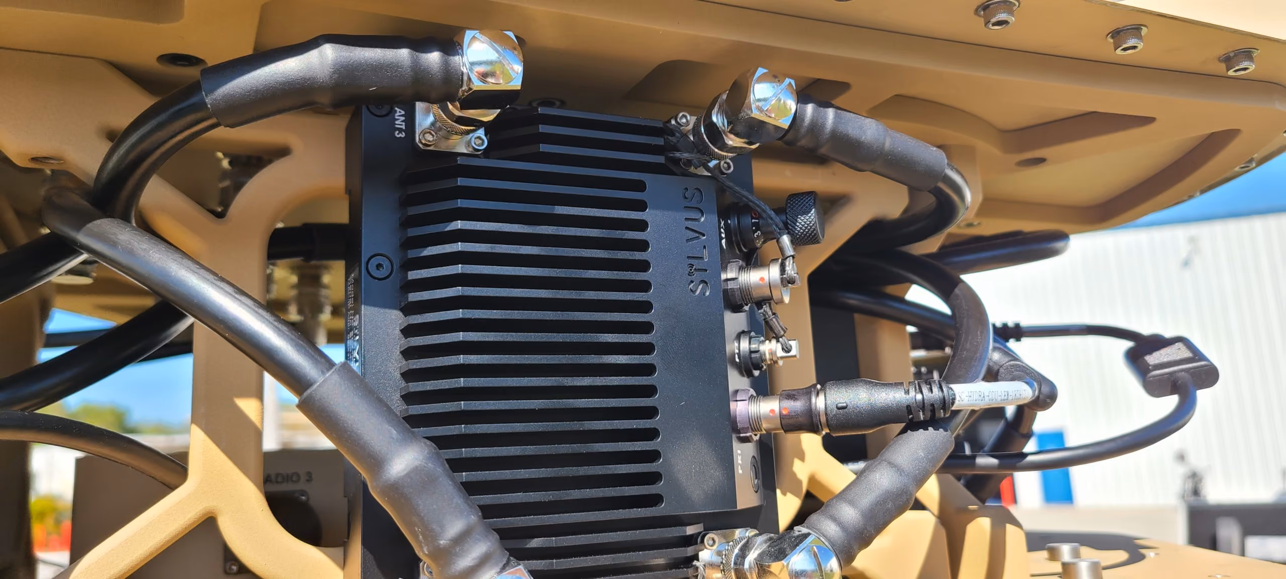 BlueSky Mast 350 Lift Series with Silvus Technologies StreamCaster MANET radio kit, deployed in the field, tactical communications application