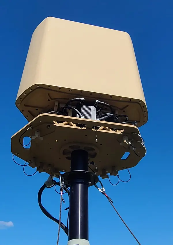 BlueSky Mast 350 Lift Series with Silvus Technologies StreamCaster MANET radio kit, deployed in the field, tactical communications application