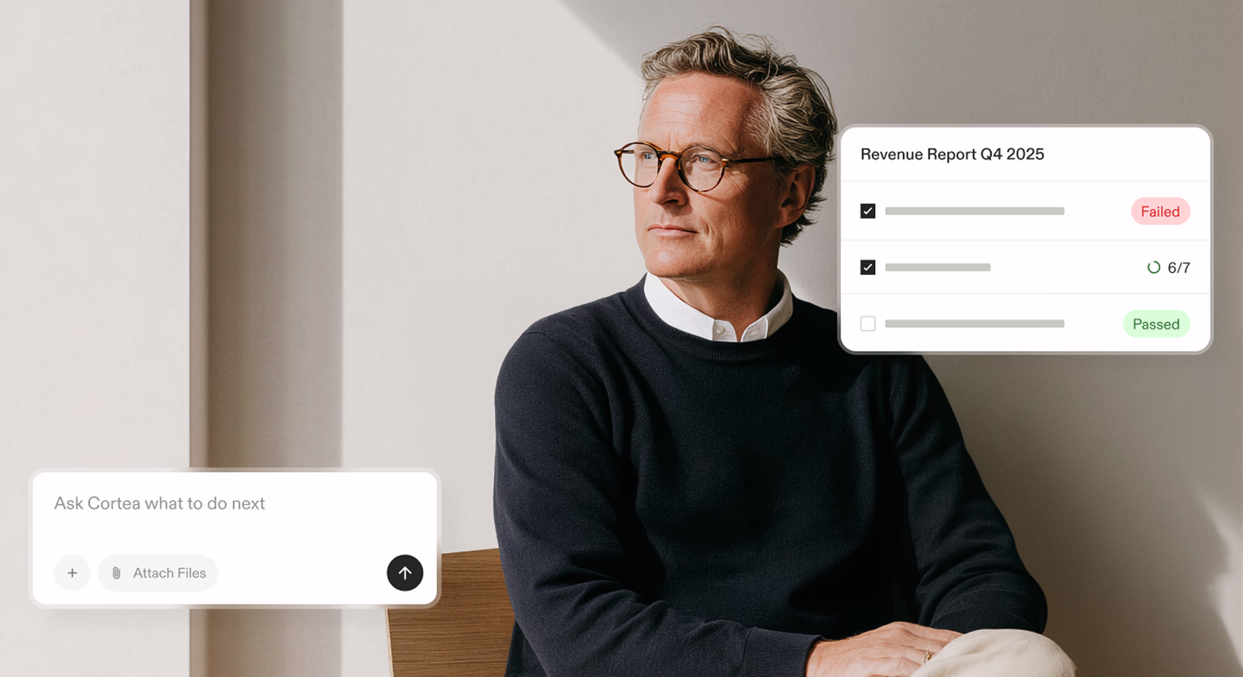 Man in glasses and black sweater looking away with digital Q4 2025 revenue report overlays.