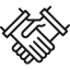 Two hands shaking in agreement, partnership, or business deal handshake gesture