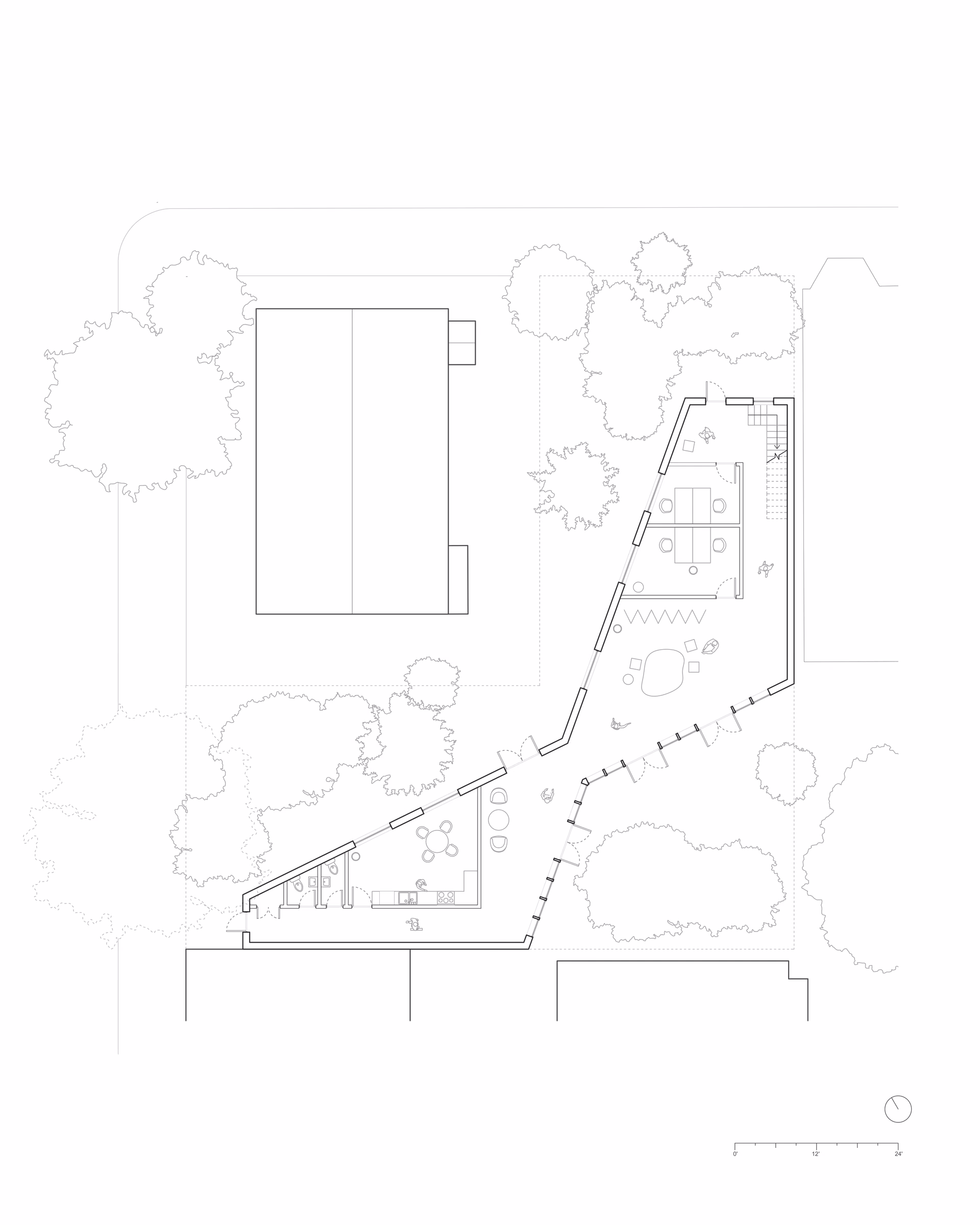 Lower-level floor plan of Spatial Transitions, showing circulation widening toward the courtyard.
