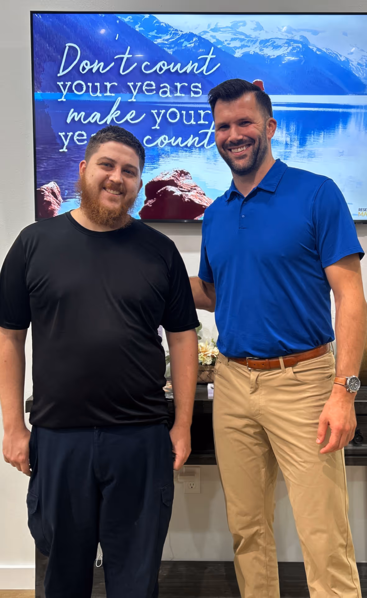 Dr. Jason O’Rear sharing a high-five with a young pediatric patient after a gentle wellness adjustment at Limitless Chiropractic in Mandeville.