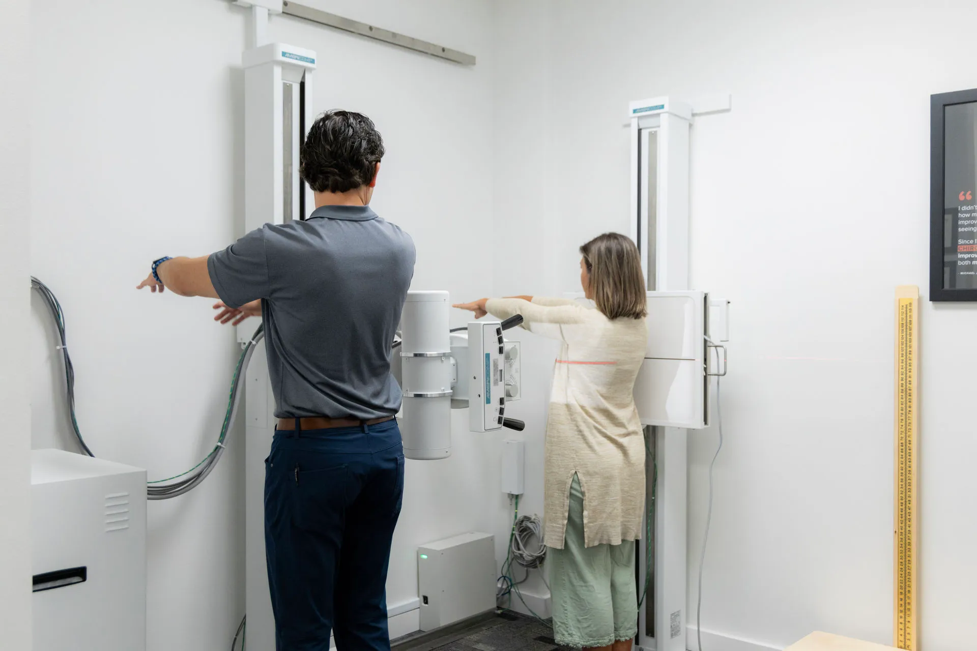 Staff at Limitless Chiropractic utilizing state-of-the-art decompression tables to create negative intradiscal pressure for Northshore residents with bulging discs.