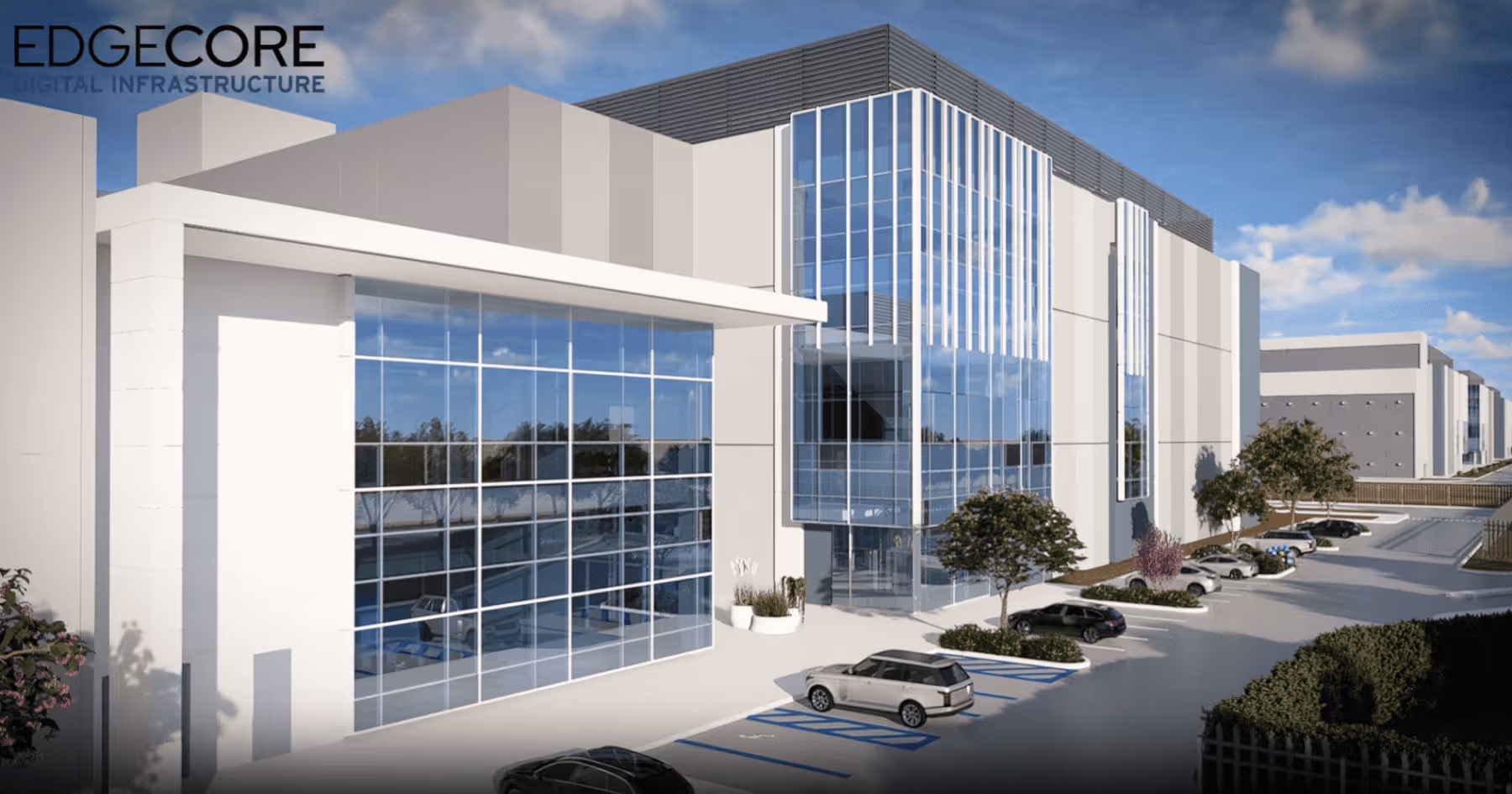 Architectural rendering of a data center campus with a glass-fronted entrance building