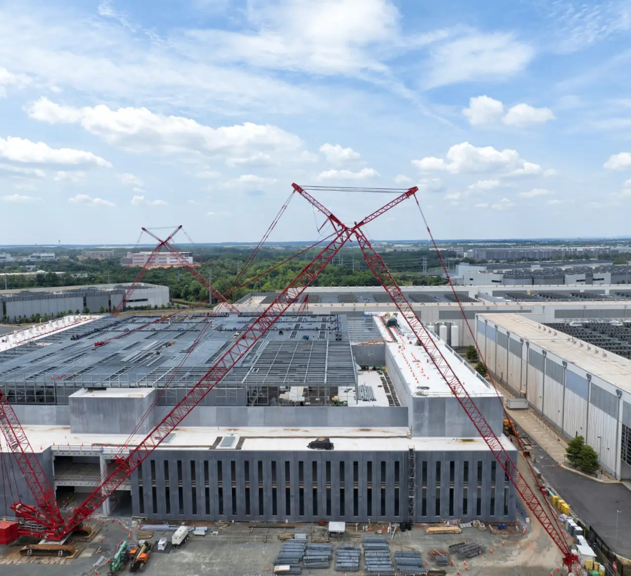A night view of downtown Los Angeles with the freeway in the foreground